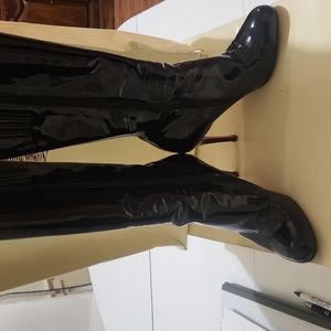 Christian louboutin black patent high heel boots.
